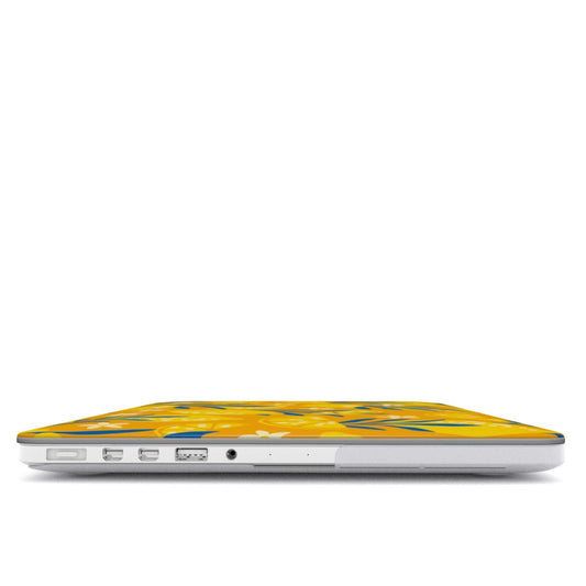 Coque MacBook motif citron jaune, vue de profil montrant l'épaisseur avec la coque et les ports dégagés