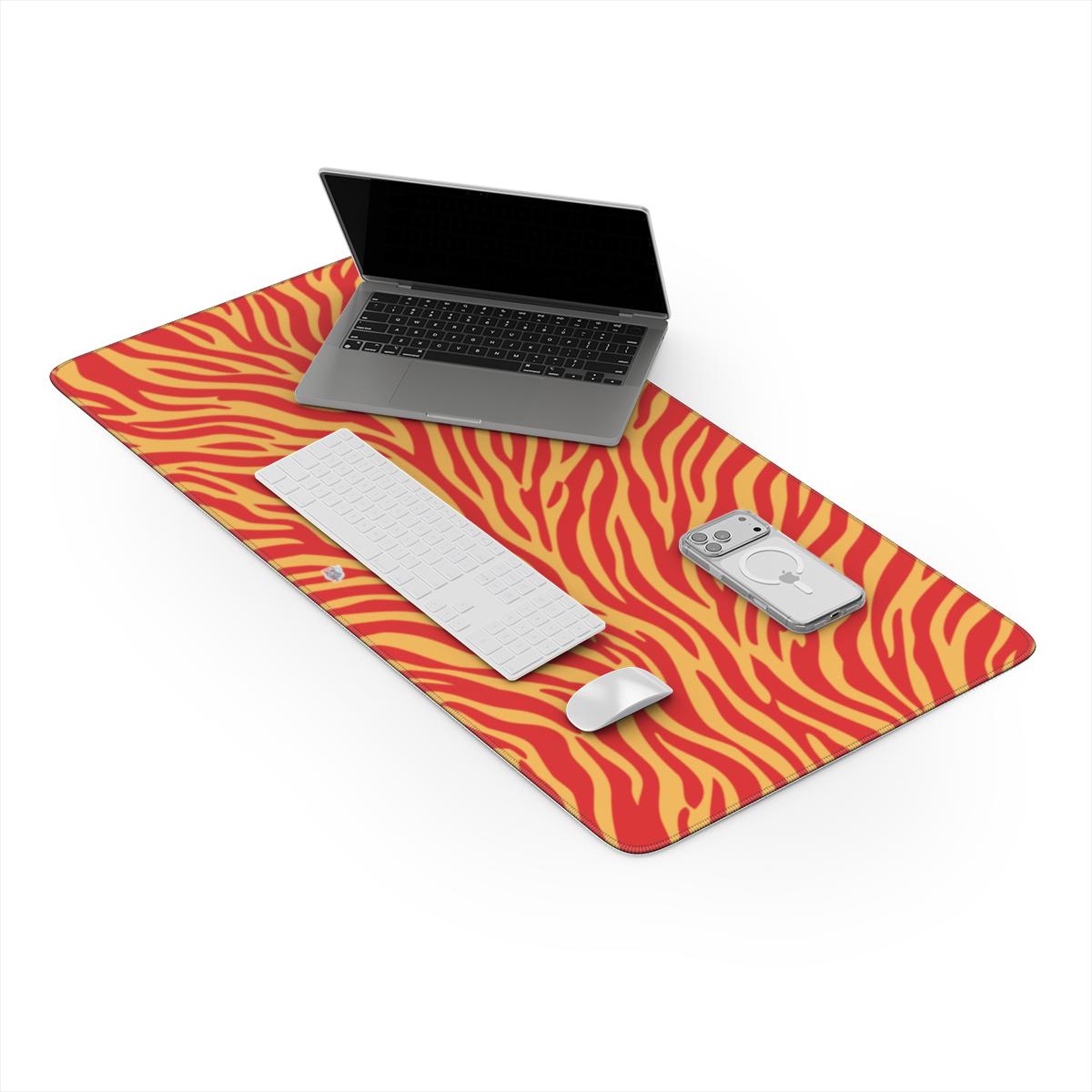Sous-main de bureau motif zèbre orange, en situation sur un bureau